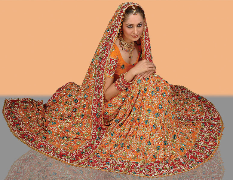 Golden_yellow_pure_crepe_bridal_lehanga_choli_designed_with_sulma_dubka